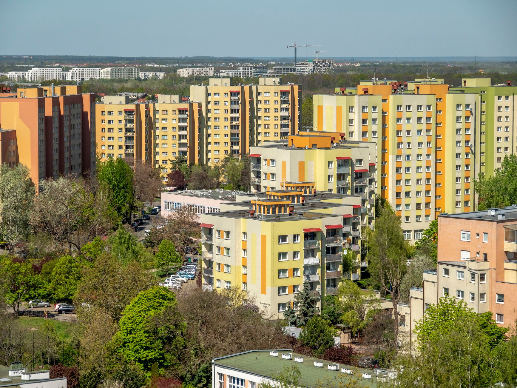 Aerial photo showcasing colorful residential apartment buildings in Wrocław, Poland during spring.