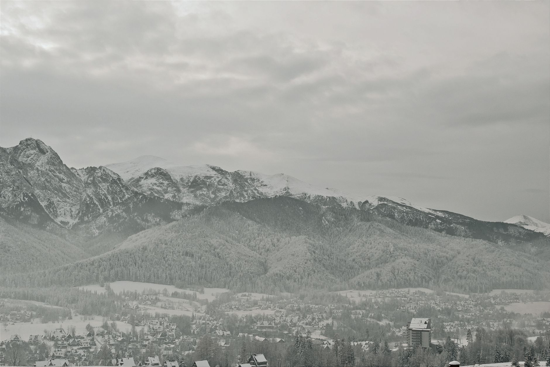 A breathtaking view of the snow-covered Tatra Mountains in Zakopane during winter.