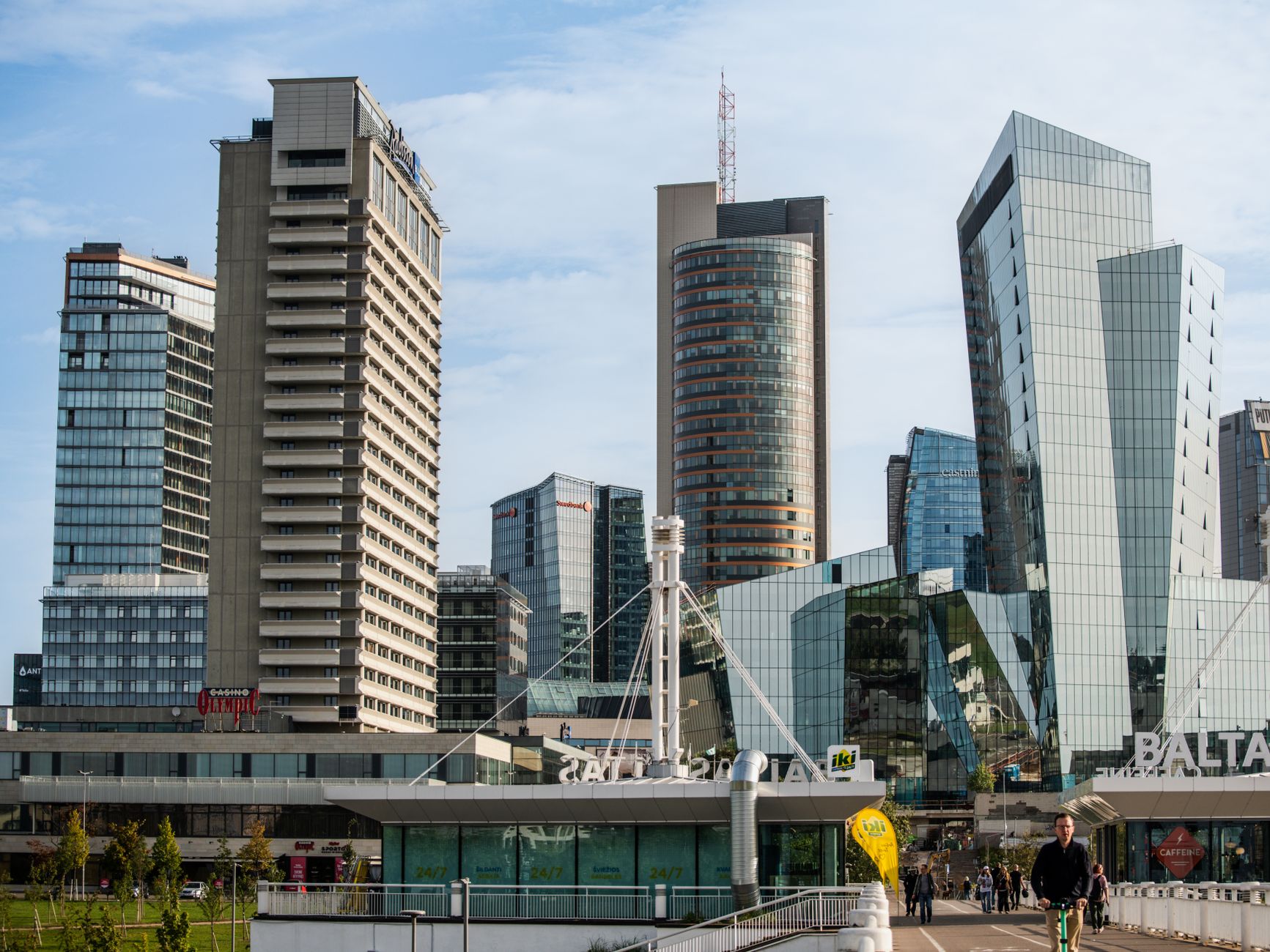 Contemporary architecture in downtown Vilnius featuring sleek skyscrapers and urban landscape.