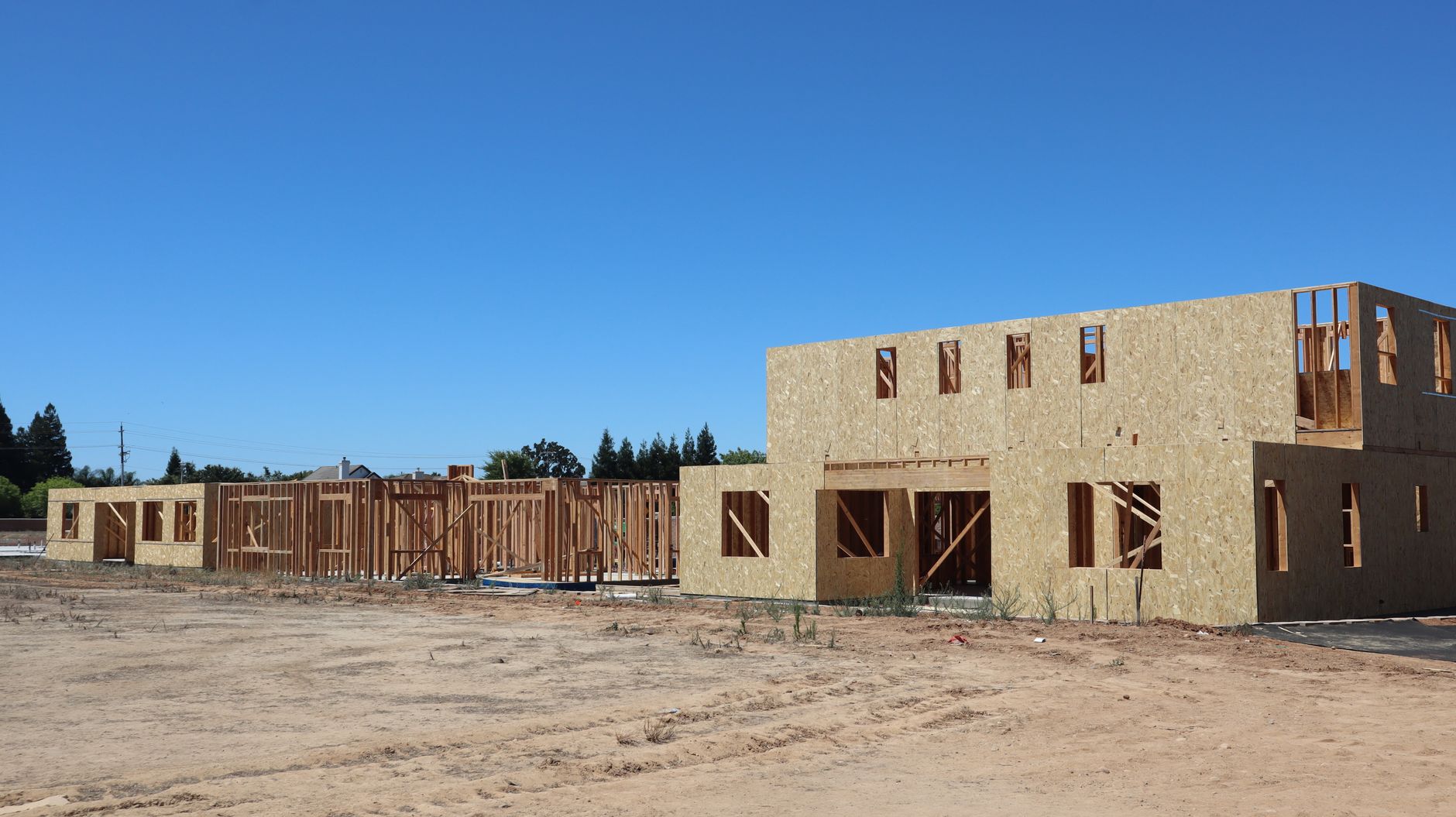 Framing of new residential buildings under construction in Elk Grove, California.