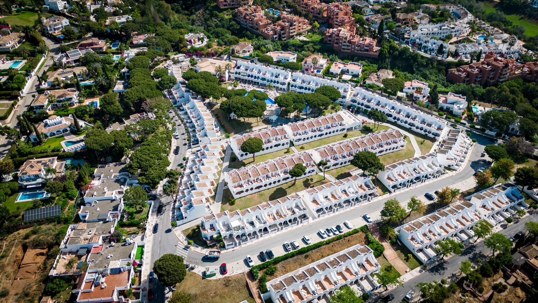Stunning aerial view of residential architecture in Marbella, Spain, showcasing unique Andalusian style