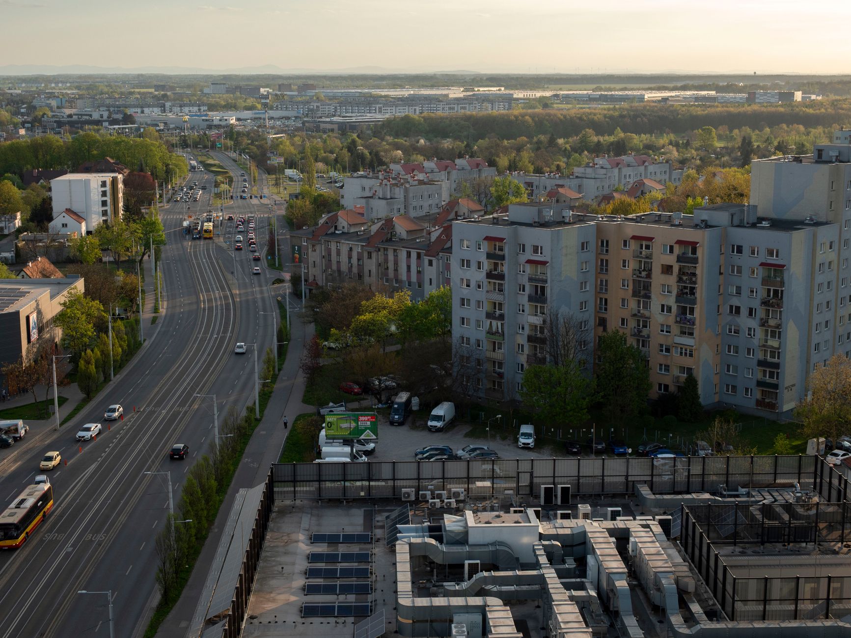 Aerial view of Wrocław cityscape with residential buildings and roads in springtime.