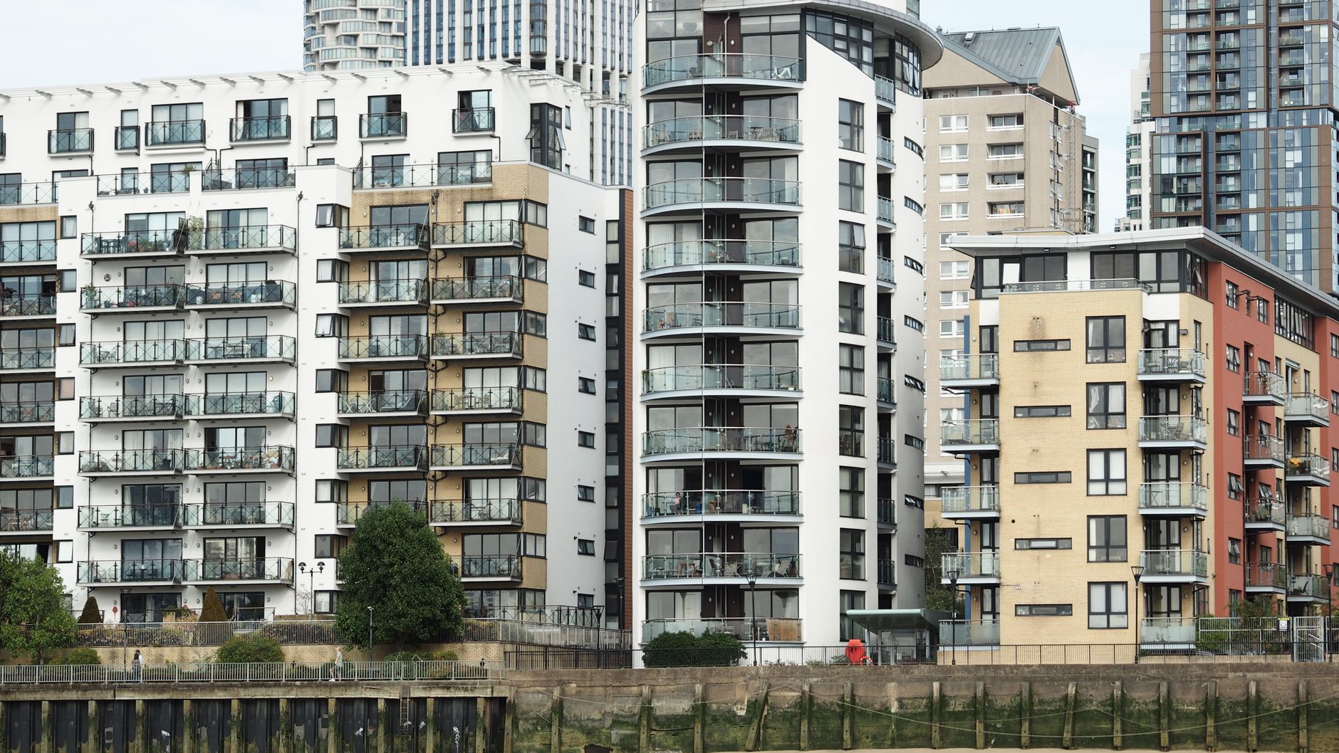 High-rise apartment buildings captured in an urban environment with modern architecture.